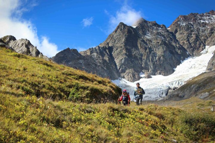 A couple hiking in the alps.