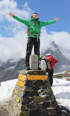 A hiker posing in the Alps.