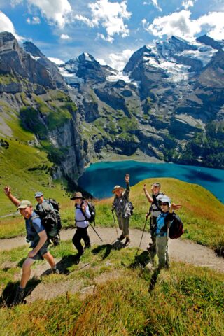 A group of hikers waving.