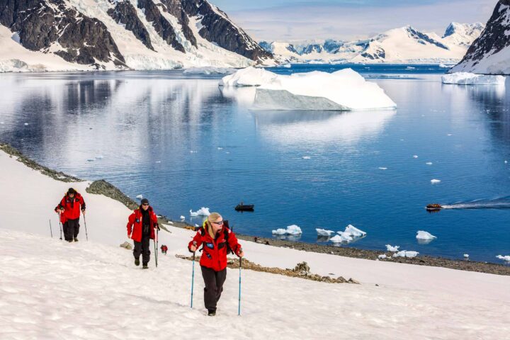 Hikers walking by Danco Coast.