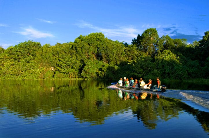 A group of tourists on a boat ride in Brazil.