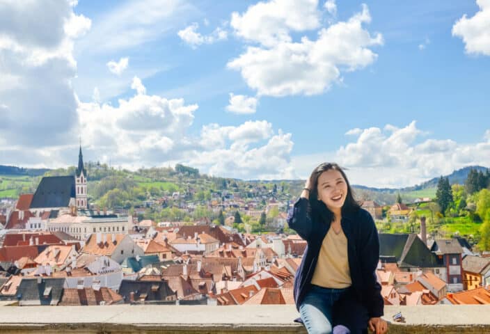 A happy woman in Cesky Krumlov, Czech Republic.