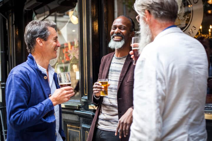 A group of friends enjoying beer together.