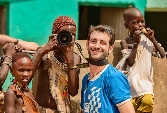 Ethiopian kids using a tourist's camera.