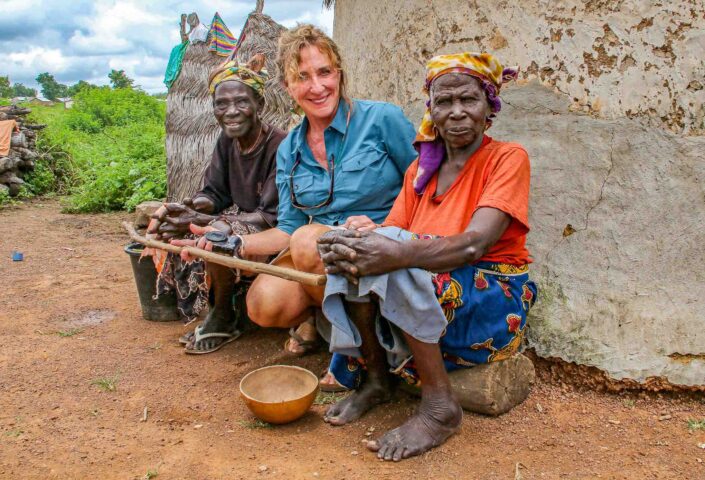 Two locals and a tourist in Ghana.