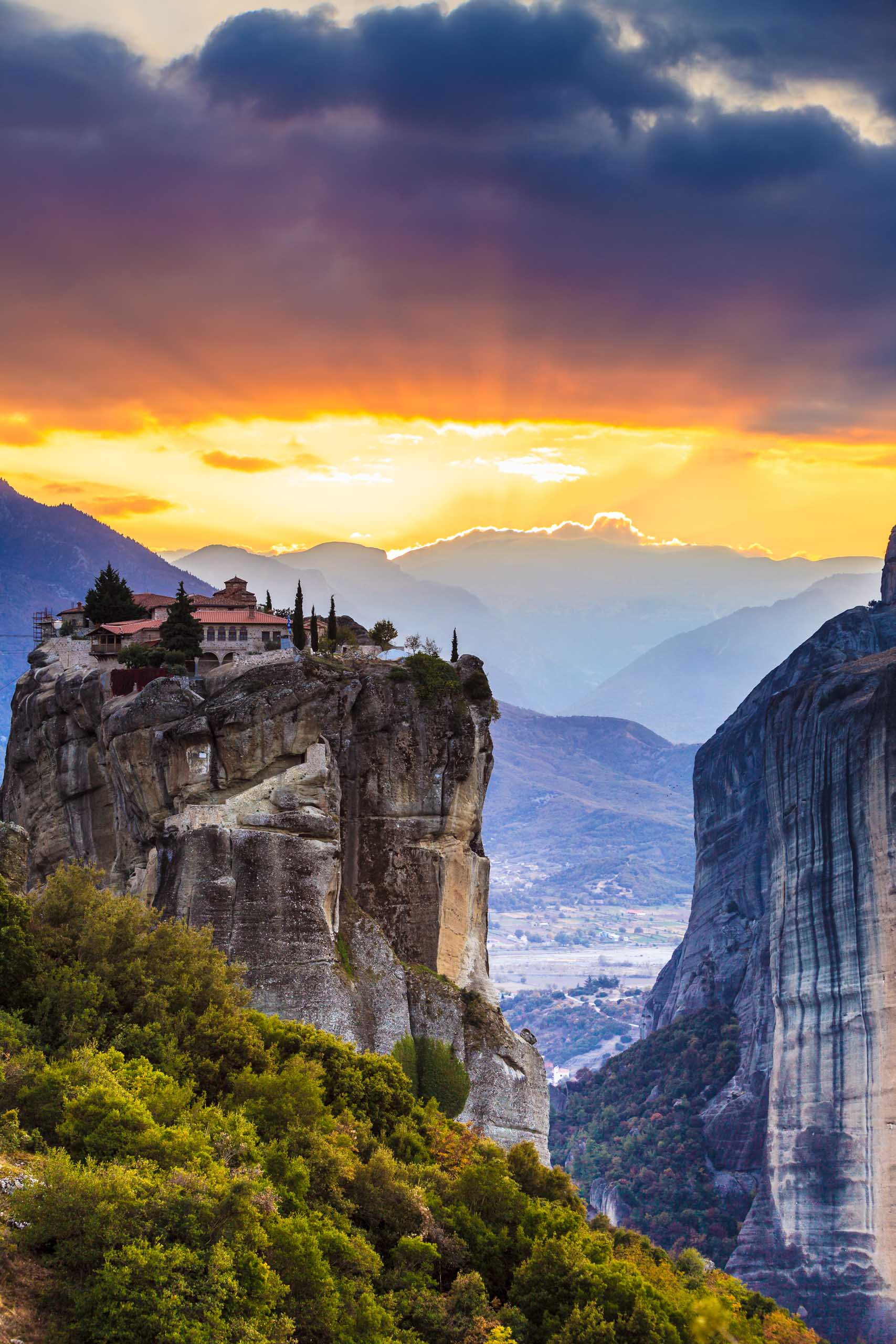 A monastery on a cliff in Greece.