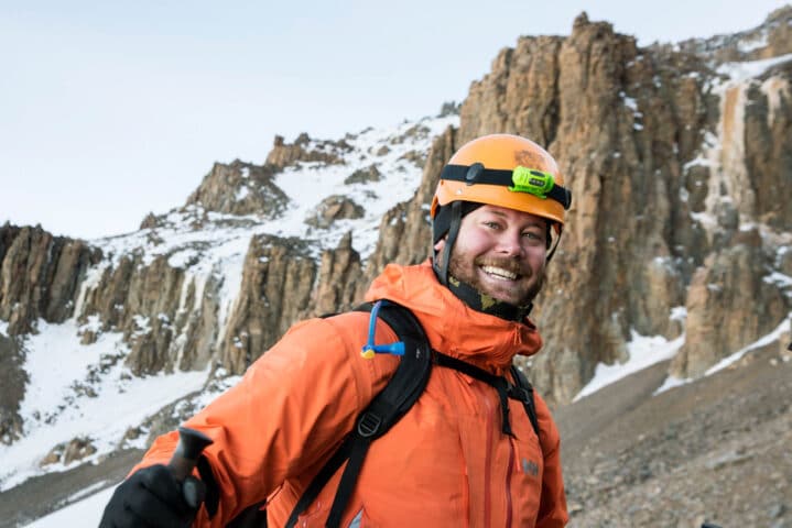 A hiker smiling.