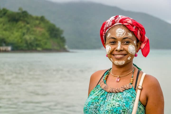 A woman with face paint.