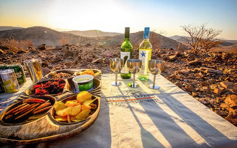 A table set up drinks and snacks.