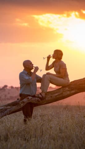 A couple enjoying a sunset.