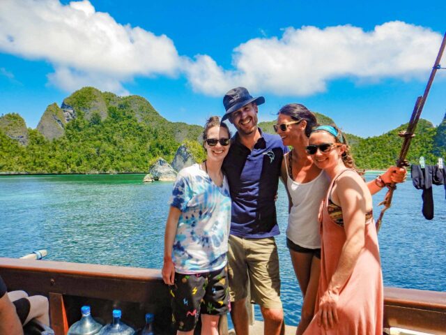 Tourists on a boat in Raja Ampat.