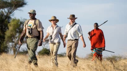 A group of people on a safari.